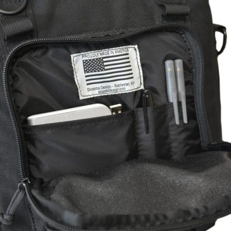 Close-up view of the front outside pocket of the Black Type S-4 Tablet Courier by Skooba Design.